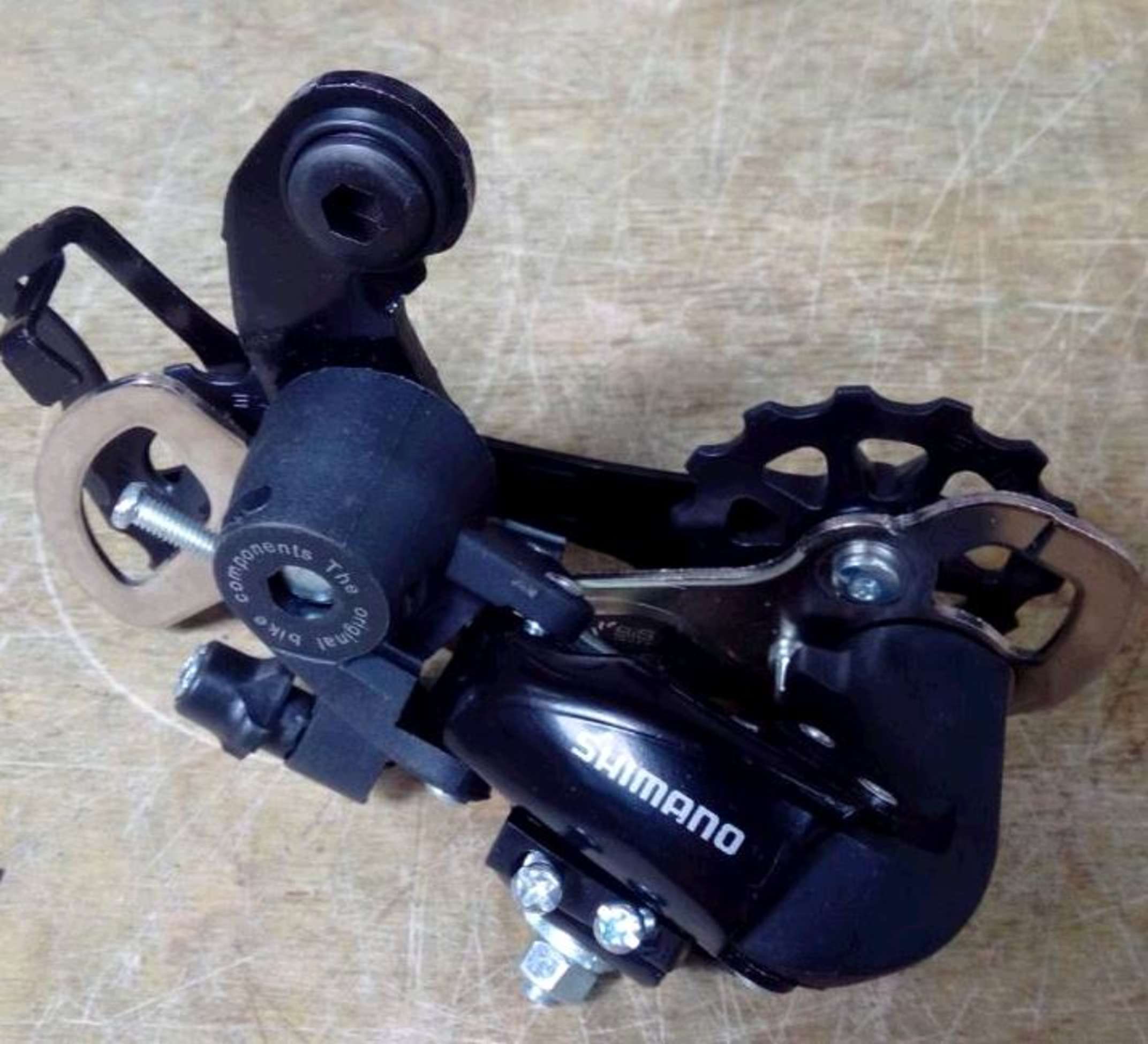 Переключатель скоростей велосипеда задний (крепеж на наконечник) (TX35) (SHMN) BDRK